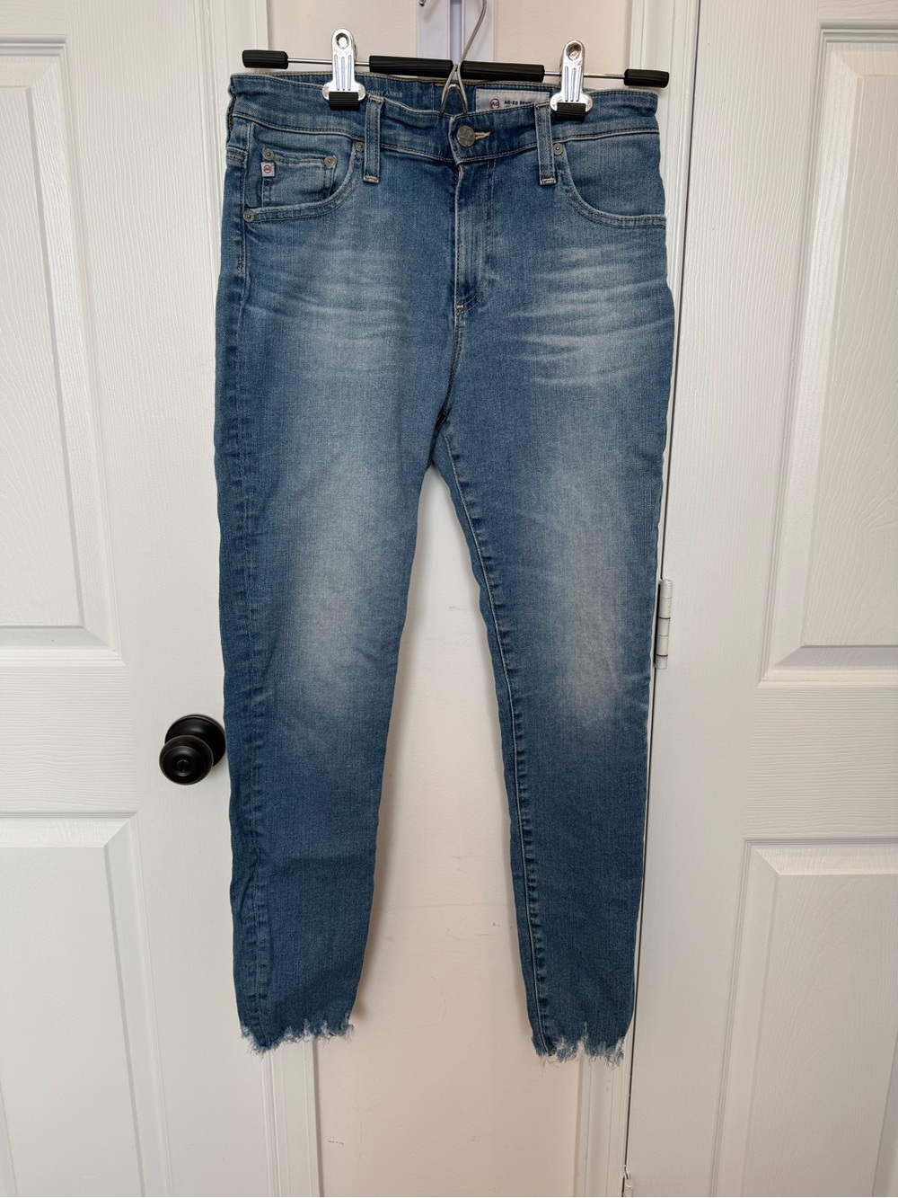 AG Adriano Goldschmied Light Blue Cropped Skinny Jeans with Frayed Hem